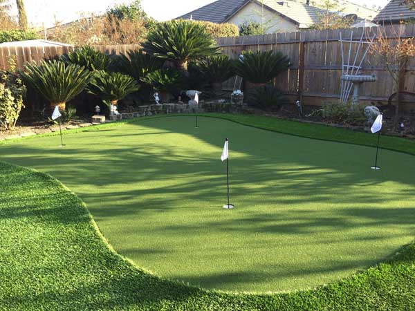 putting green landscaped with synlawn
