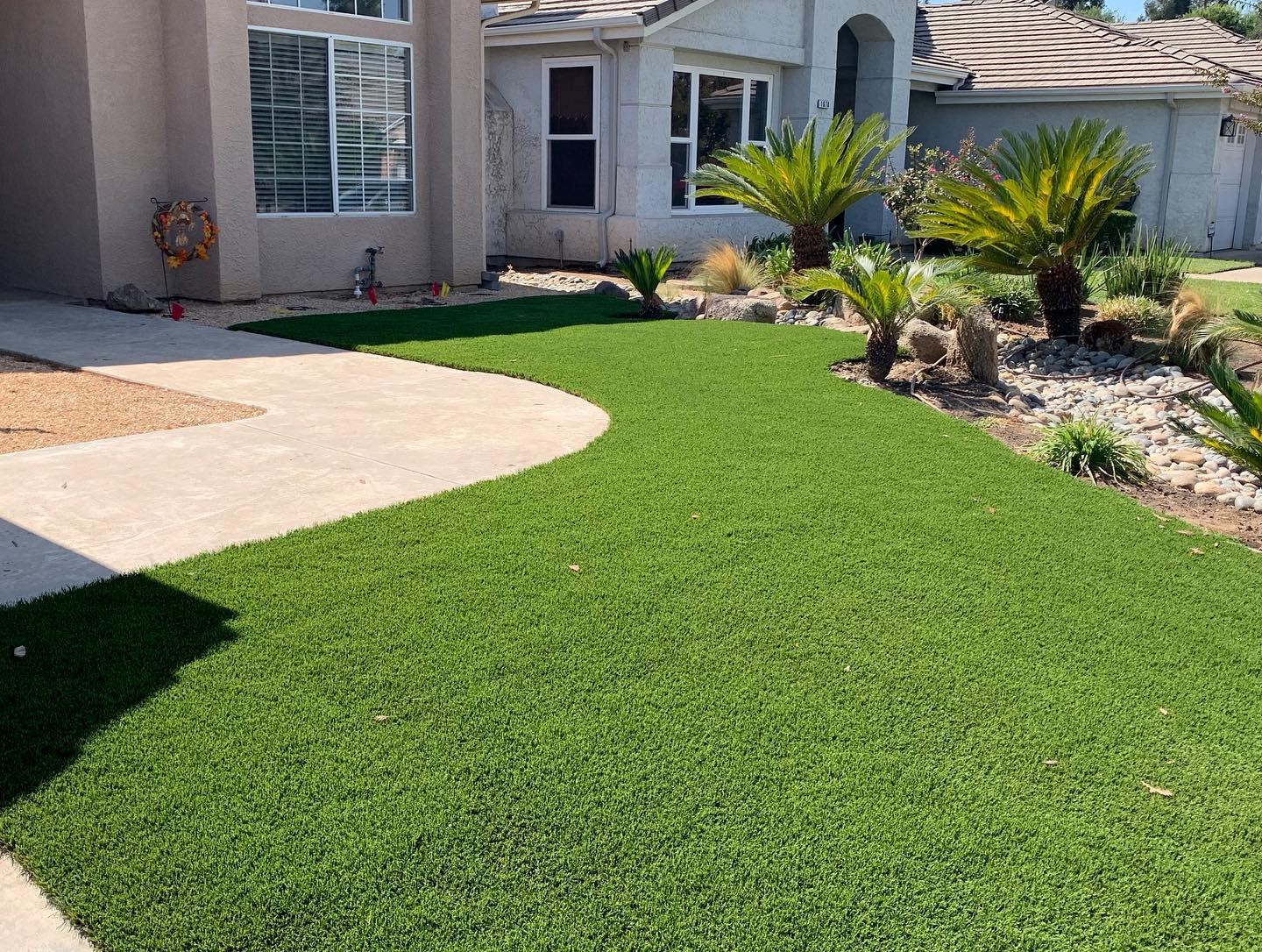 A synthetic grass lawn in a Fresno backyard.