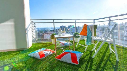 Apartment rooftop balcony built with artificial grass