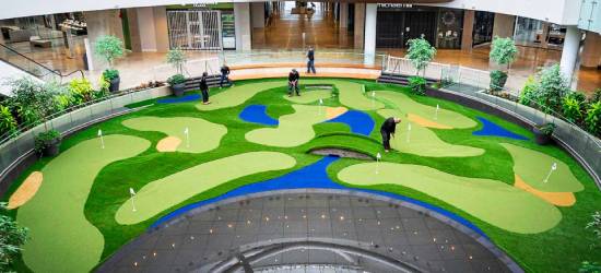 Artificial grass putting green at shopping mall