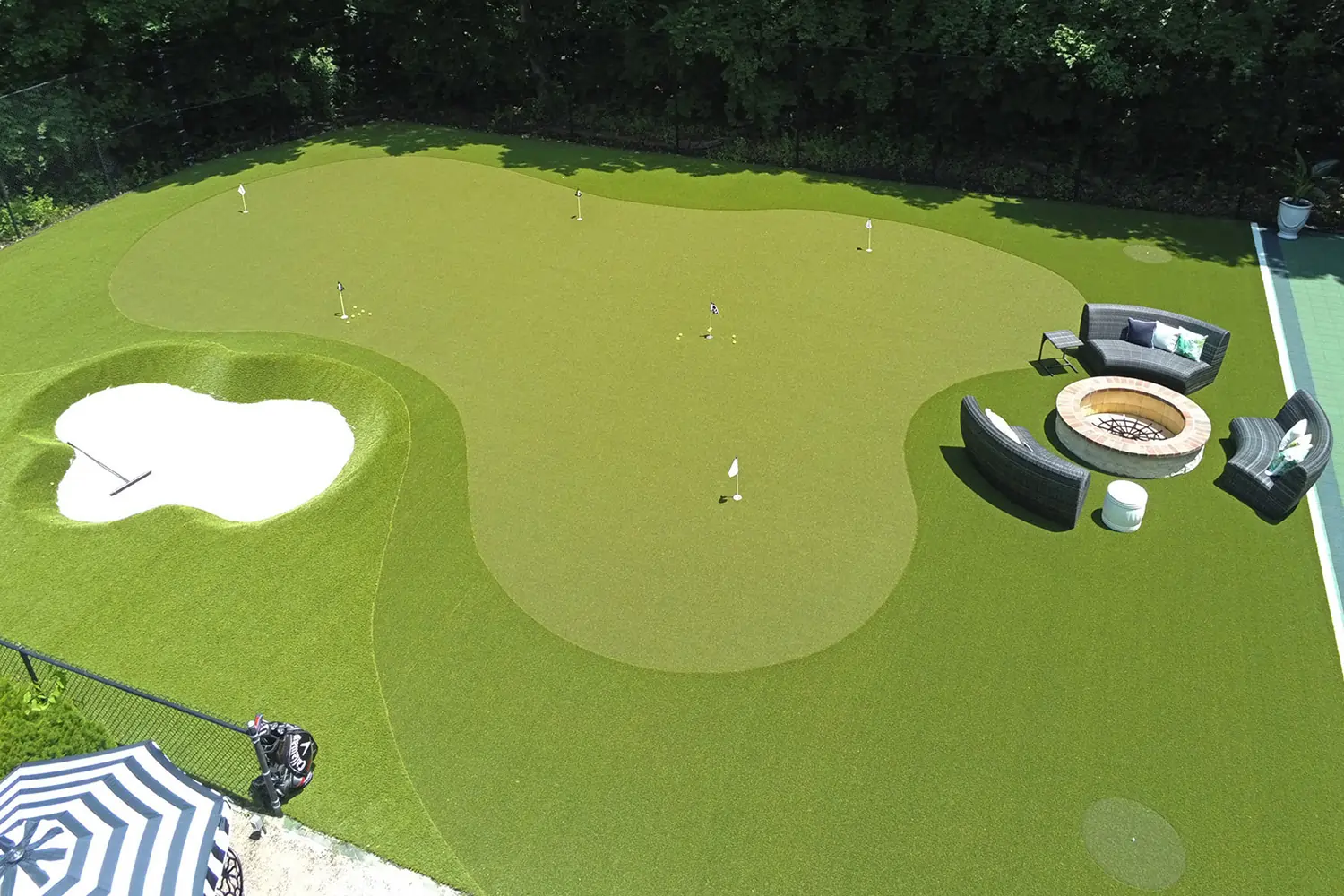 Backyard golf green installed by SYNLawn