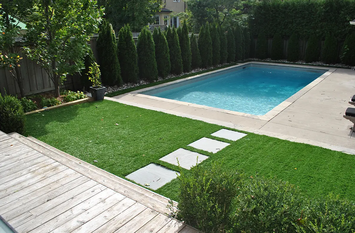 Artificial grass pool area installed by SYNLawn